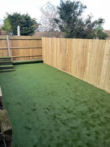 Minimalist garden featuring a full area of artificial lawn for low maintenance and aesthetic appeal