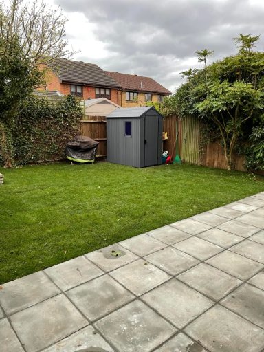 Newly installed patio and lawn, showcasing a fresh and inviting outdoor space